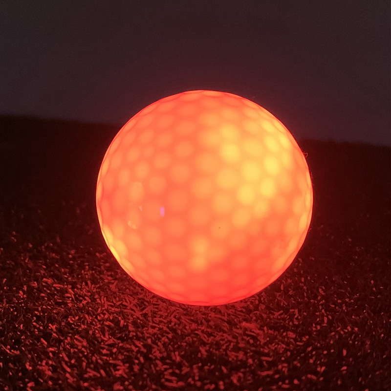 LED luminoso Juego de Pelota de GOLF automático de siete colores GOLF noche CAMPO DE GOLF pelota de práctica al por mayor