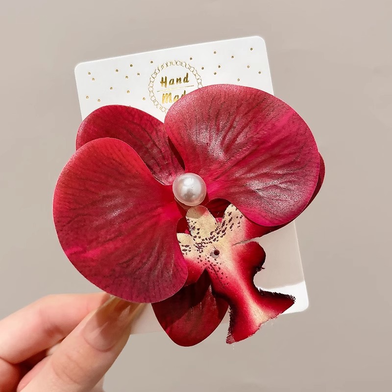 Caro con rosa roja clip de agarre para mujeres 2025 nuevo toque de cabeza de flores de super hadas explosión clip de tiburón