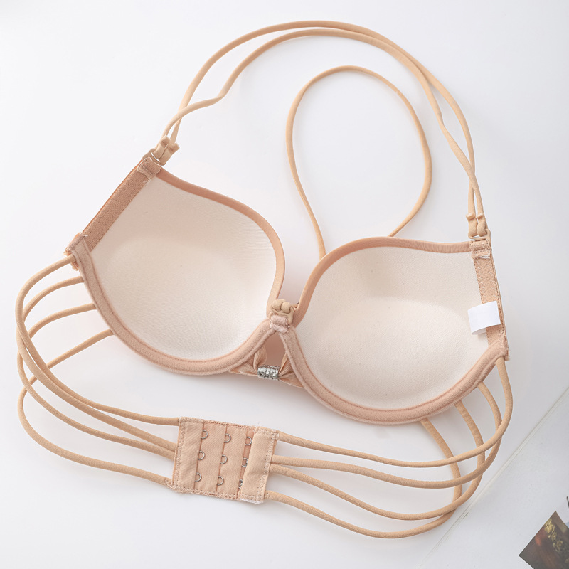 Fábrica de stock de pecho pequeño engrosado reunido brillante cinturón de cuello sin marca sexy ropa interior de moda para chicas