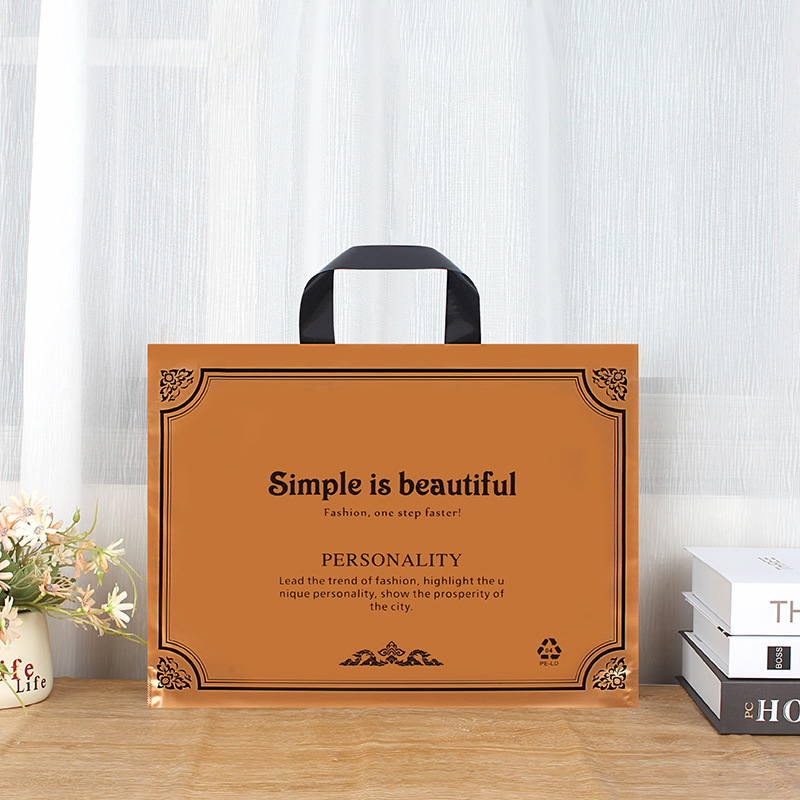 Tienda de ropa de suministro de fábrica bolso transparente logotipo impreso bolsa de embalaje de regalo bolsa de plástico de embalaje de ropa al por mayor
