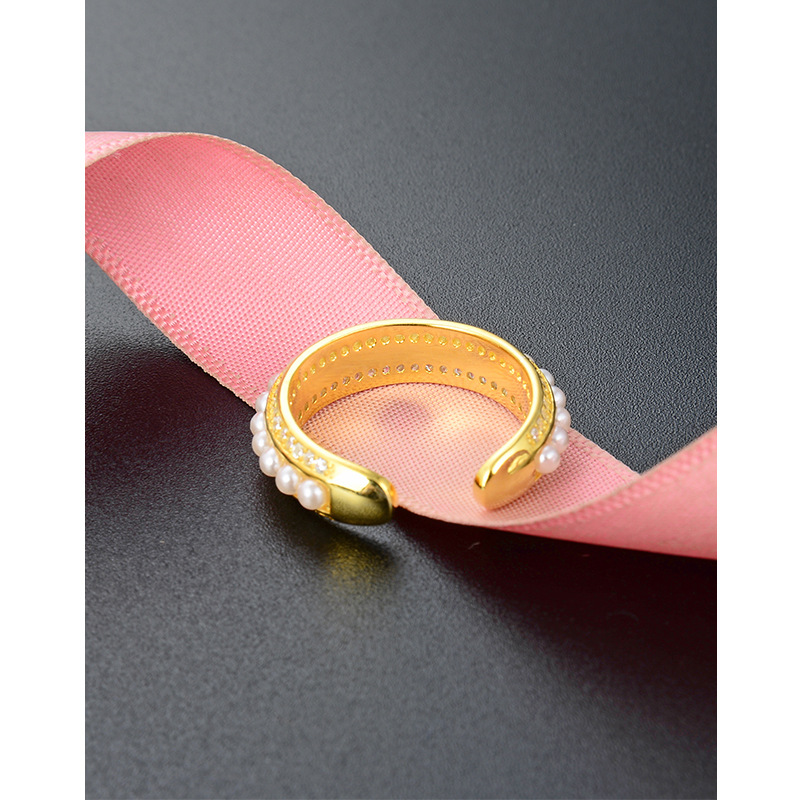 Una sola fila de perlas s925 anillo de plata estilo coreano creativo fresco anillo de oro fuente fábrica al por mayor