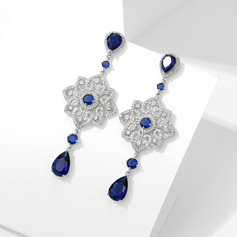 Light luxury high-end heavy industry earrings banquet dress with long hollow pattern water drop earrings_voghion.com