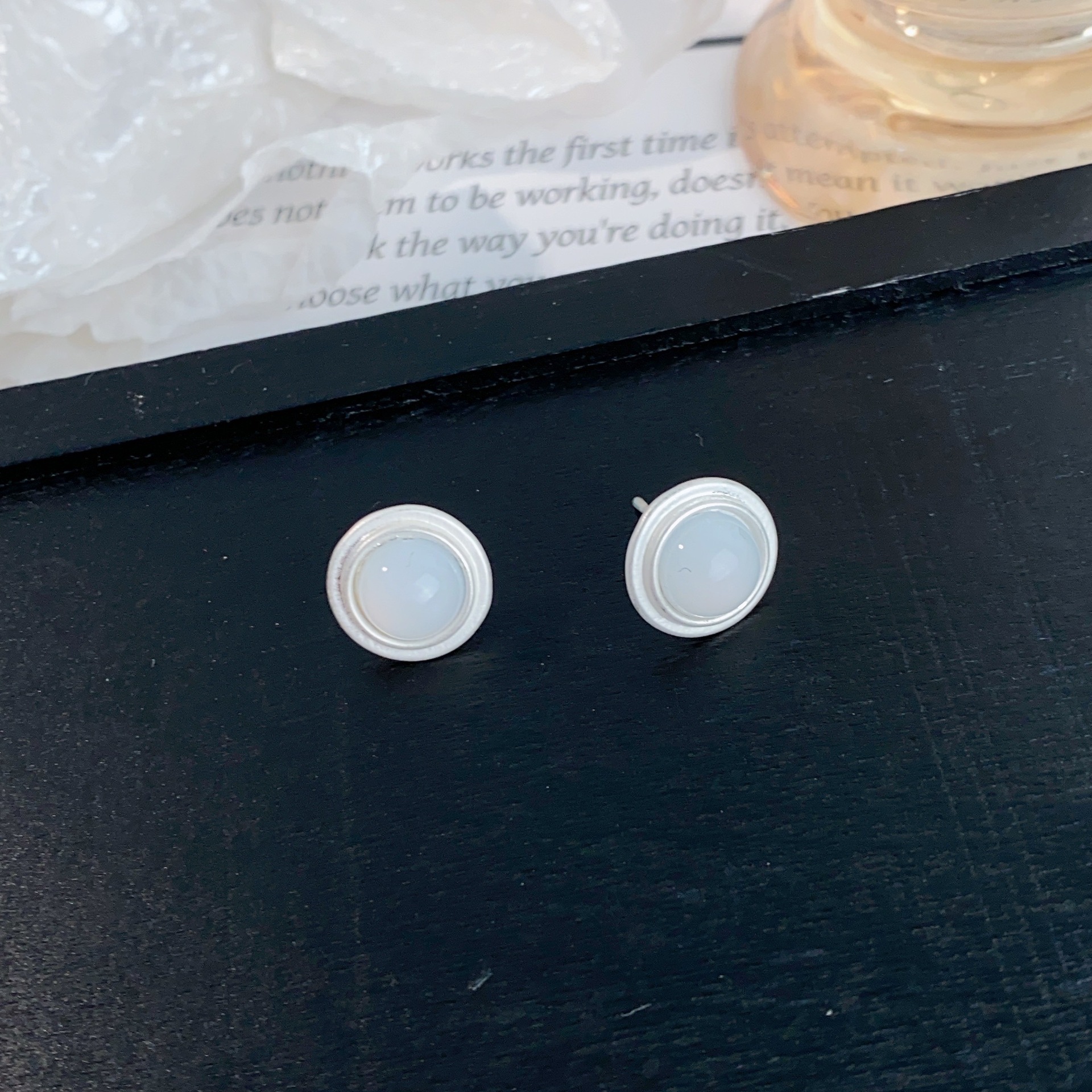 Matte white earrings, cat's eye