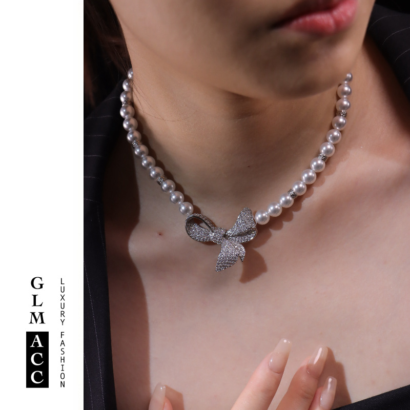 Elegant retro trend fashionable necklace with zircon with bow from…