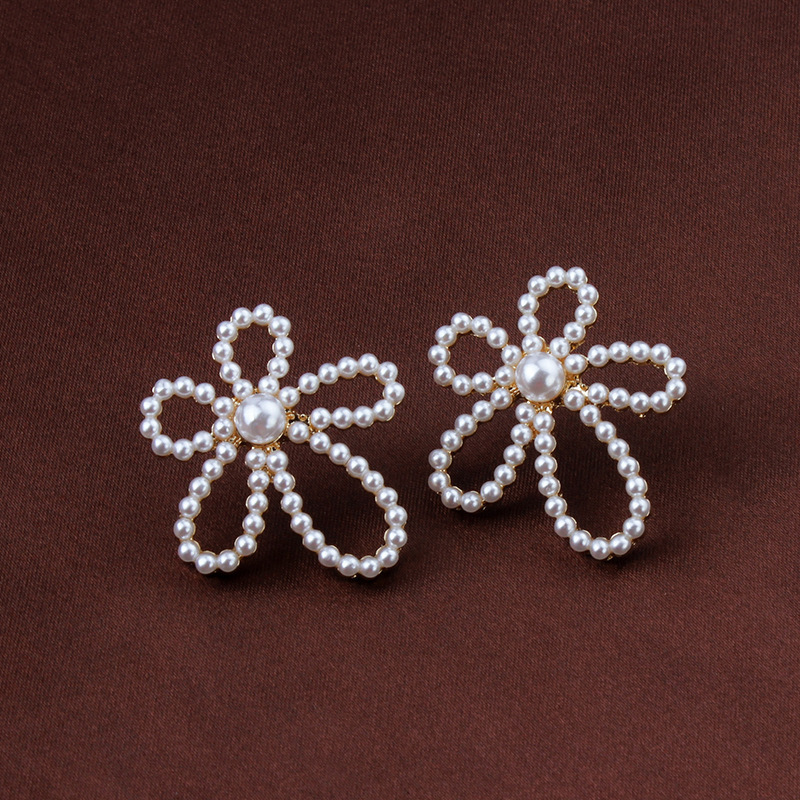 Wholesale Jewelry Hollow Flower Diamond Pearl Earrings Nihaojewelry display picture 3