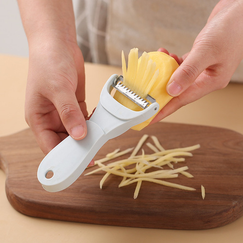 Creative two-in-one peeler household stainless steel fruit peeler scraper peeler melon grater wholesale