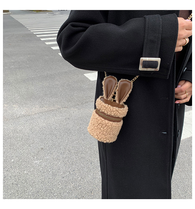 2021 winter new trendy female bag Korean cute rabbit ear plush messenger bucket bagpicture5