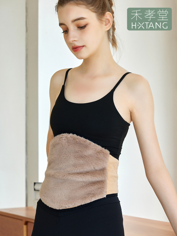 ベルトを保護して保温しています。女性の防寒は胃を温めています。|undefined