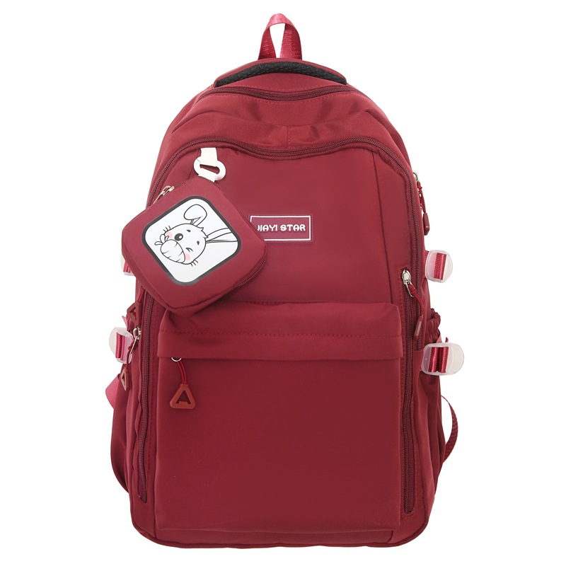 Mochila de estudiantes de moda simple 2025 nueva mochila casual de color sólido mochila de viaje de gran capacidad soporte personalizado