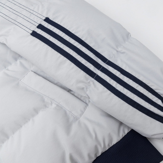 Moda nacional Color americano a juego lado a rayas de algodón acolchado abrigo de los hombres y las mujeres de invierno engrosada pareja de pan abrigo cálido