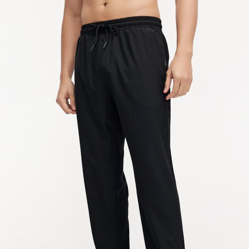 Primavera y verano de 2025 nuevos pantalones de carrera para hombres pantalones rectos de secado rápido sueltos pantalones deportivos casuales negros versátiles