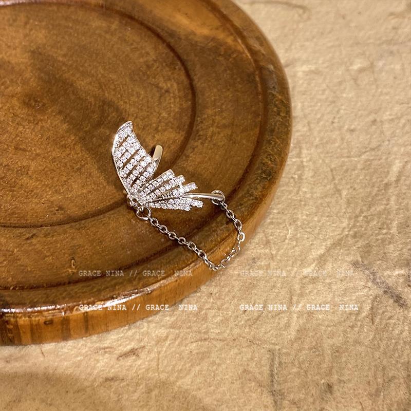 Silver butterfly ear bone clamp the left ear sheet is only installed