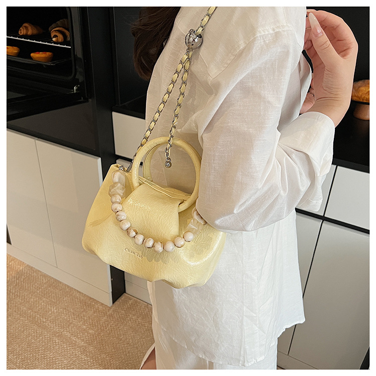 A stylish and trendy beaded bag for women, a new summer chain crossbody cloud bag for women in 2025 undefined