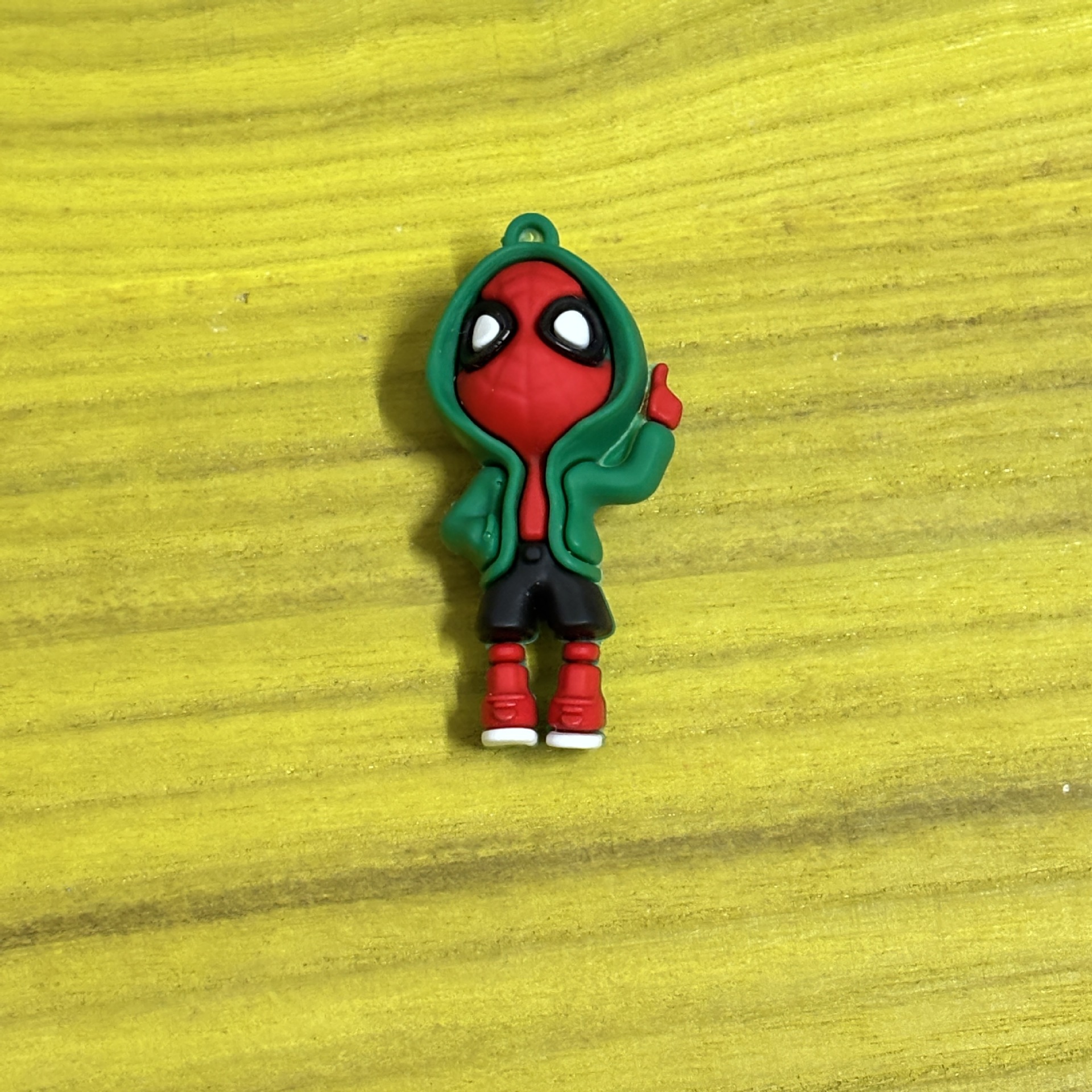 Green doll, Spiderman