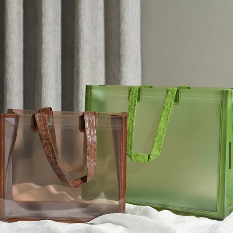 可肩背PVC时尚手提袋礼品袋服装袋复合塑料袋防水环保可盯制LOGO