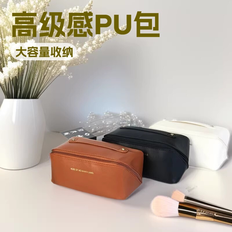 New Style Pu Cosmetic Bag, High-End Large-Capacity Pillow Bag, Travel Storage Bag, Portable Hand-Held Storage Bag Wholesale New Style Pu Cosmetic Bag, High-End Large-Capacity Pillow Bag, Travel Storage Bag, Portable Hand-Held Storage Bag Wholesale