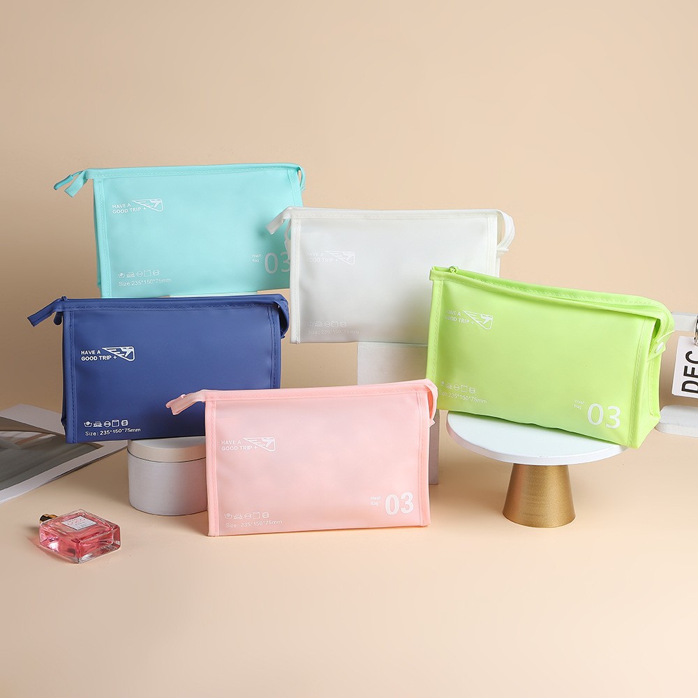 Bolsa de lavado impermeable de viento ins Bolsa de almacenamiento de cosméticos horizontal de gelatina de PVC Bolsa de cosméticos de moda de viaje de mano
