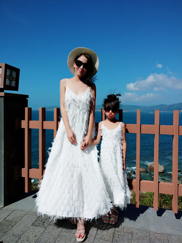 Parent-child summer wear  new style beach skirt seaside vacation white suspender backless feather long skirt dress
