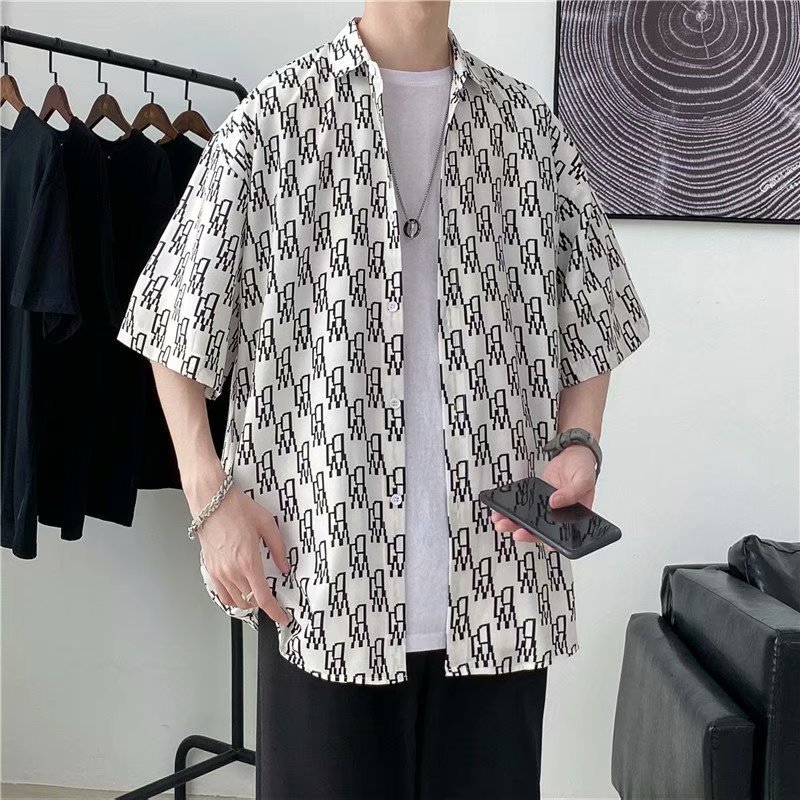 Hong Kong estilo Retro Vintage floral camisa manga corta Estilo Hawaiano tailandés diseño Ruan guapo camisa suelta para hombres y mujeres