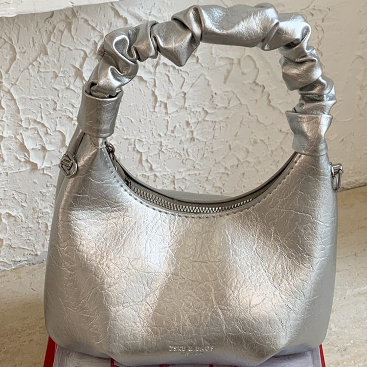 2026 primavera nueva moda temperamento bolso de hombro de moda bolso de arco de moda moda bolso de mano de tendencia diaria plegado mochila
