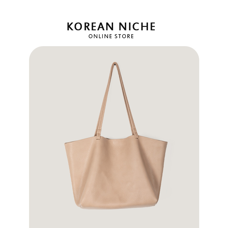 Nuevo diseño de nicho coreano, bolso de hombro de cuero suave con estampado de lichi para mujer, bolso de mano sencillo de gran capacidad para desplazamientos diarios_voghion.com