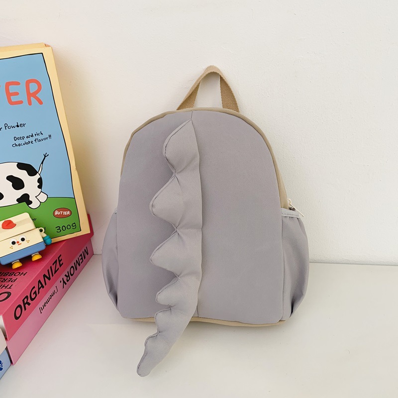 Mochila infantil transfronteriza de dibujos animados lindos dinosaurios cola mochila para niños y niñas jardín de infantes pequeña clase mochila para niños
