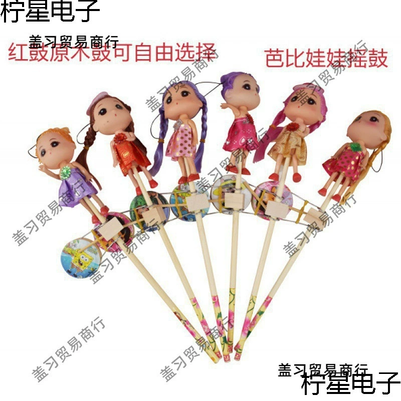 Игрушки встряхивают ручные барабаны