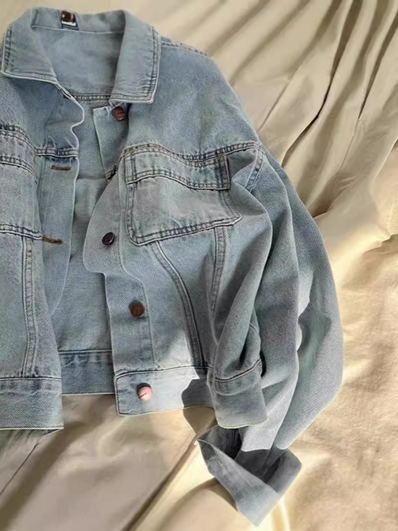 ネットの赤いヨーロッパ式の水は綿の復古のデニムのコートを洗います。