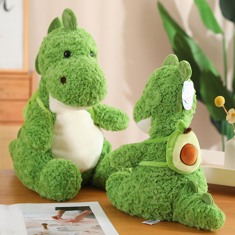 Mochila transfronteriza de aguacate, muñeca de dinosaurio, cama para niños, almohada, peluche, niña, muñeca para dormir, dragón de flores cepillado