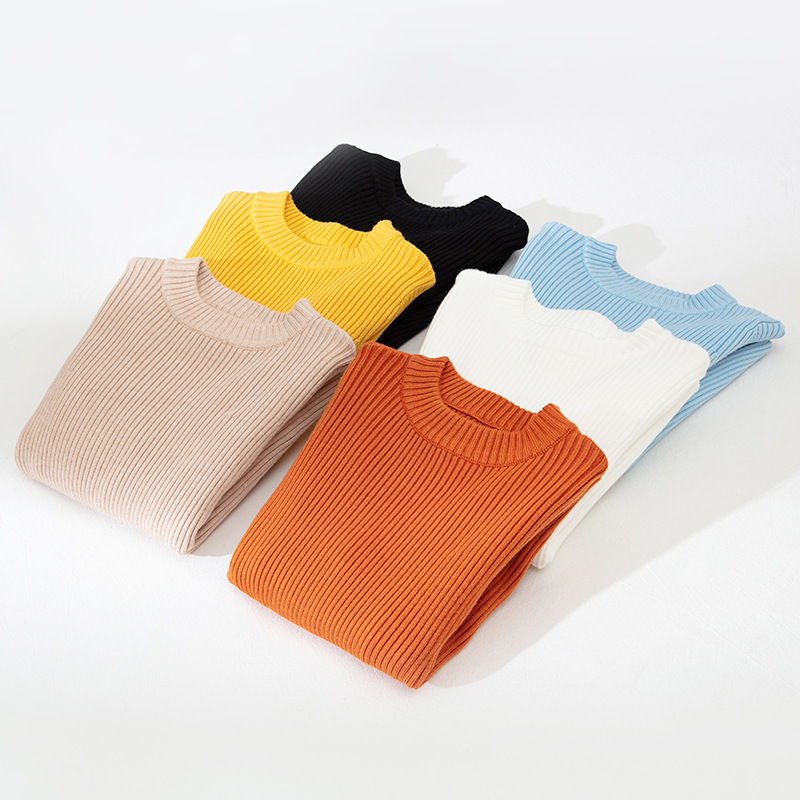 Suéteres infantiles 2025, nuevo estilo de otoño e invierno, ropa interior de punto para niños y niñas, suéter de cuello redondo versátil de color liso.