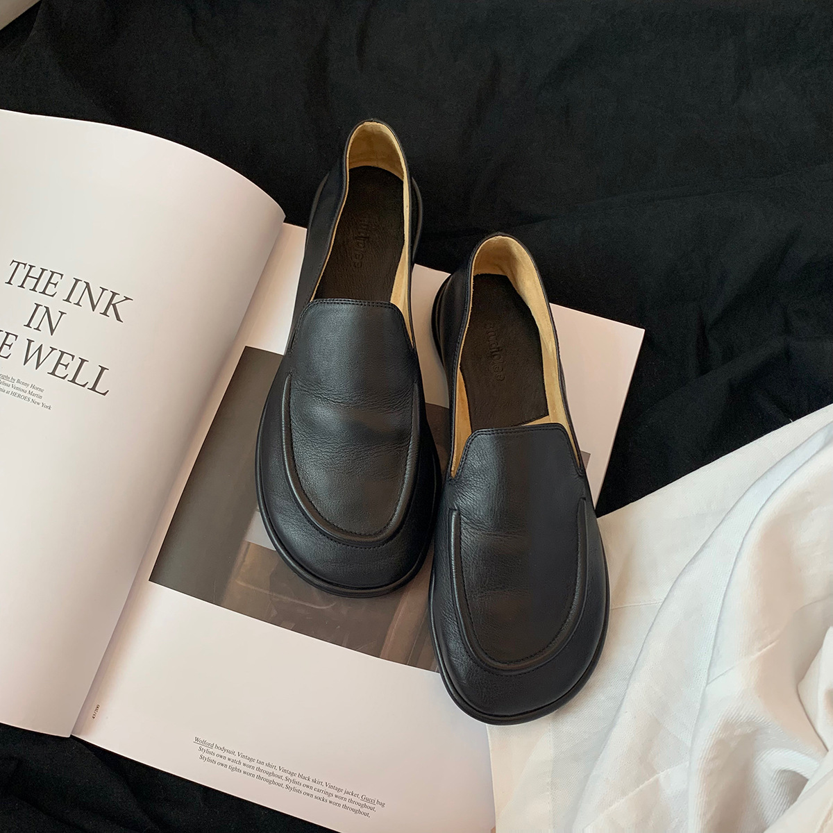 Versión de piel de oveja de la madre de la uva con el mismo estilo de los zapatos individuales de la nube de la cabeza redonda, un pie, zapatos suaves y cerosos de todo fósforo, zapatos de cuero para mujer