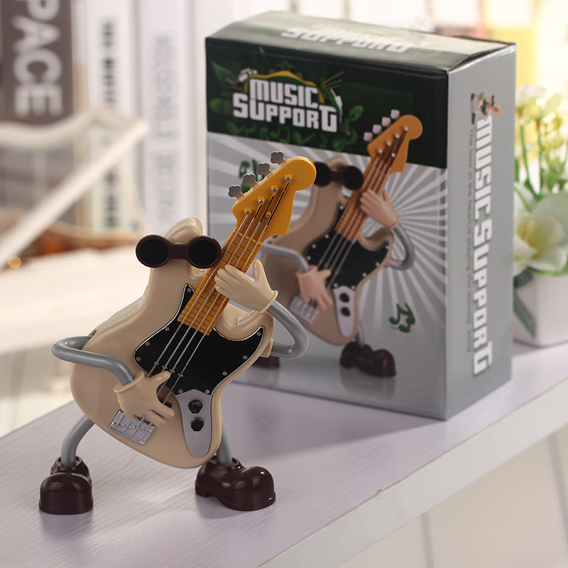 Creativo nueva guitarra muñeca caja de música oscilación automática decoración de escritorio caja de música de dibujos animados regalo de vacaciones al por mayor