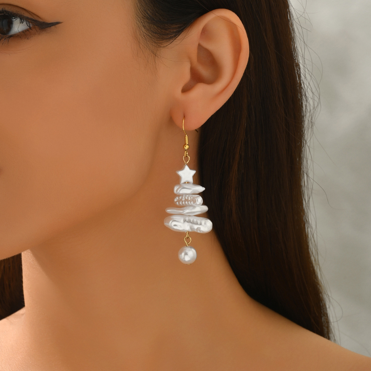 Orecchini pendenti con perle barocche e stelle gioielli donna_voghion.com