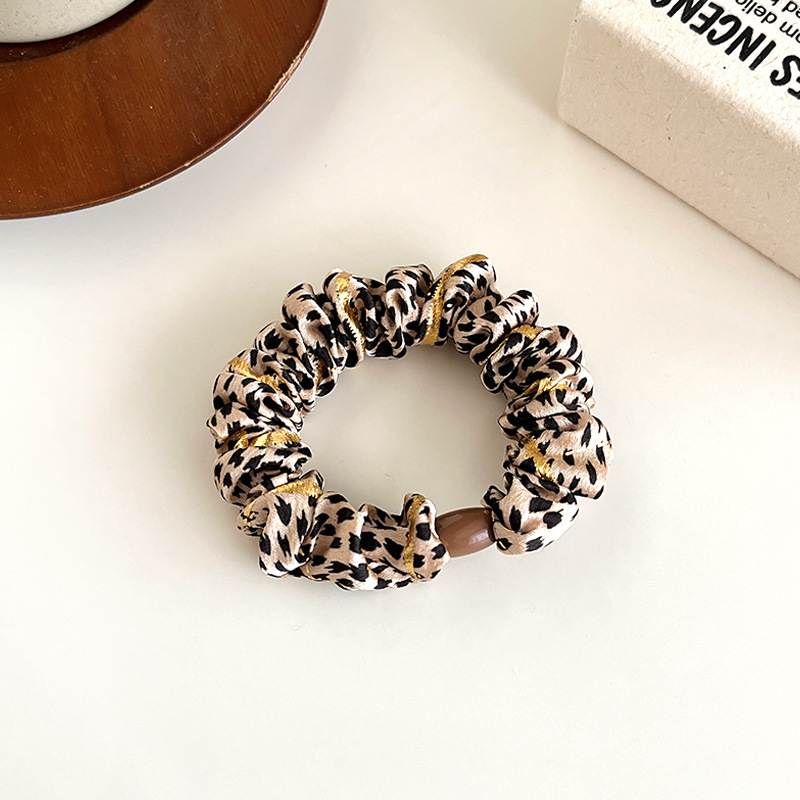 Temperamento europeo y americano estampado leopardo anillo de cabello simple de alta elástica cuerda de cabello gruesa cuerda de cabello de bolas duradera correa