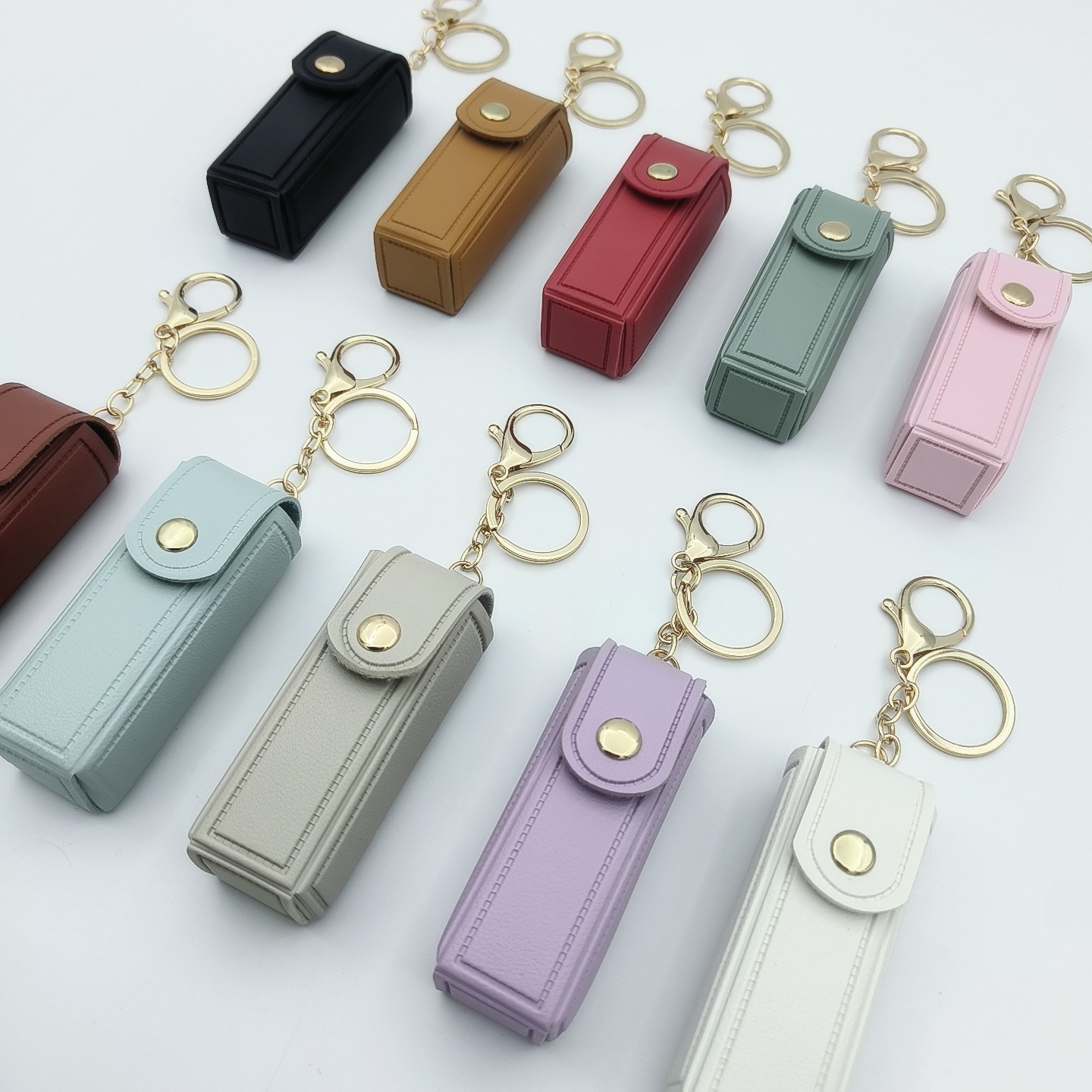 Bolso de cambio transfronterizo sobre rojo espejo creativo llavero colgante pequeño PU cuero bolso de coche accesorios accesorios en stock