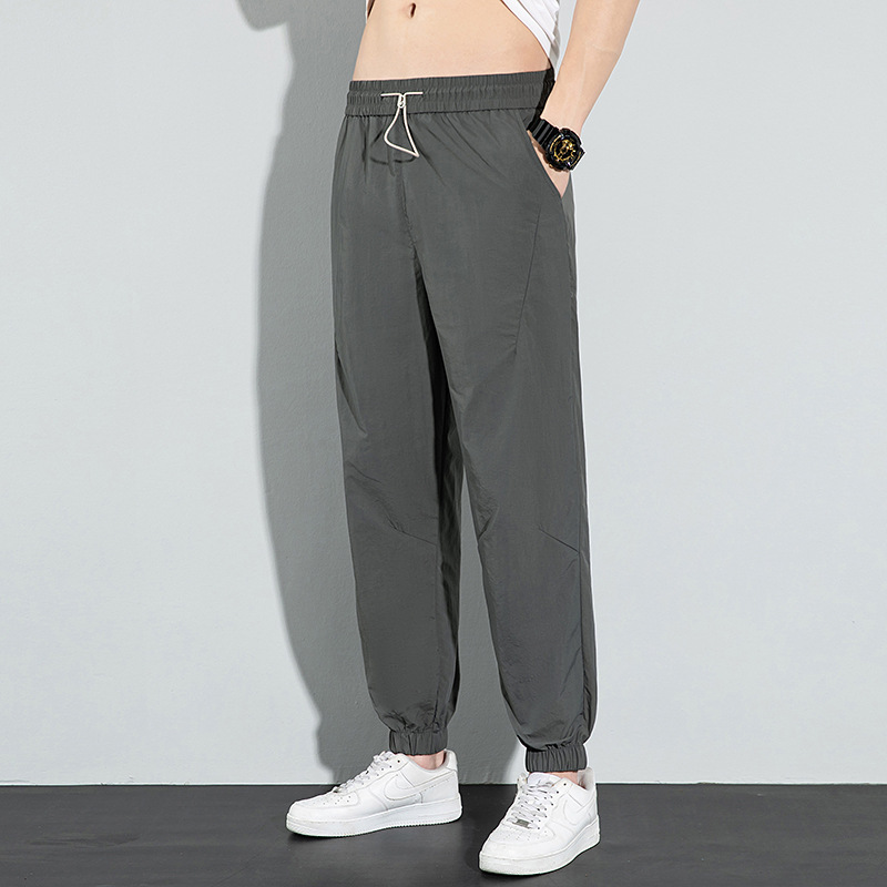 Pantalones de seda de hielo para hombres 2024 verano delgado suelto transpirable pantalones deportivos de secado rápido pantalones elásticos de pies de hielo casuales