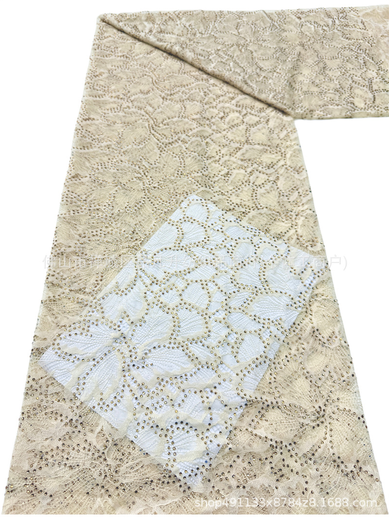 Nuevo hueco flor de encaje fondo tela de perforación caliente pesada cola de pez vestido de boda vestido de noche brindis tela spot