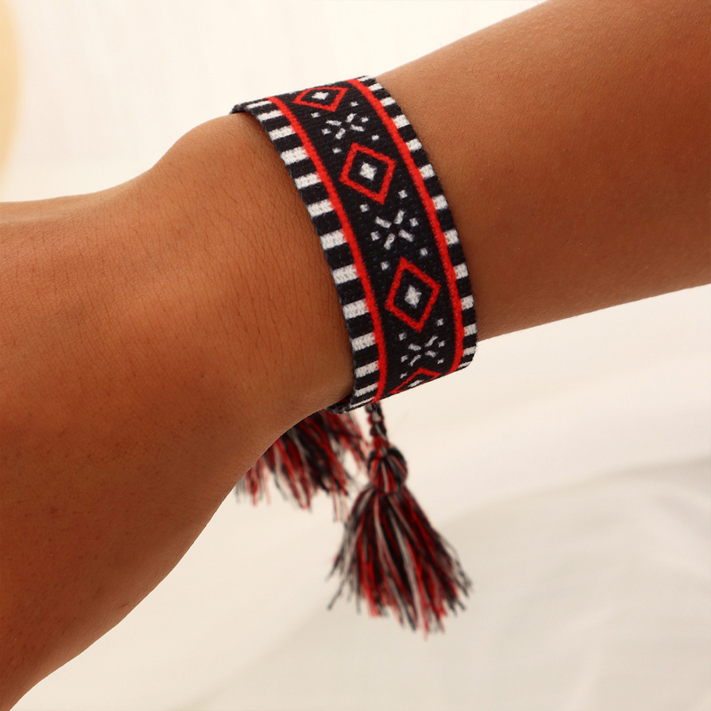 Ethnic Style Handmade Letter Embroidery Tassel Braided Bracelet Colorful Friendship Hand Rope Wristband display picture 1