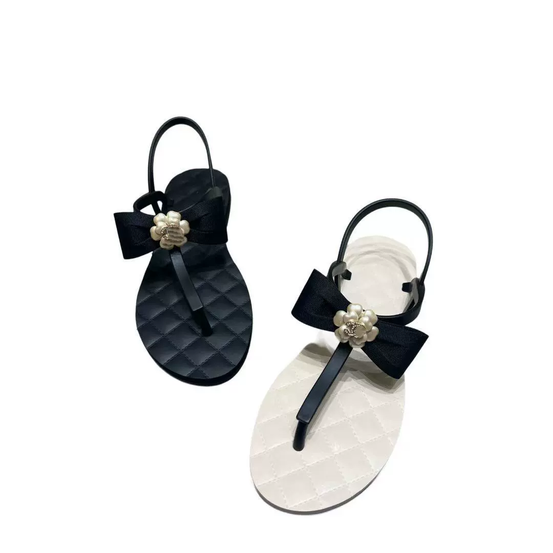 Zhetao новый маленький ароматный цветок сверлильный пряжка бант плоские сандалии фея песчаные сандалии на пляже оптом