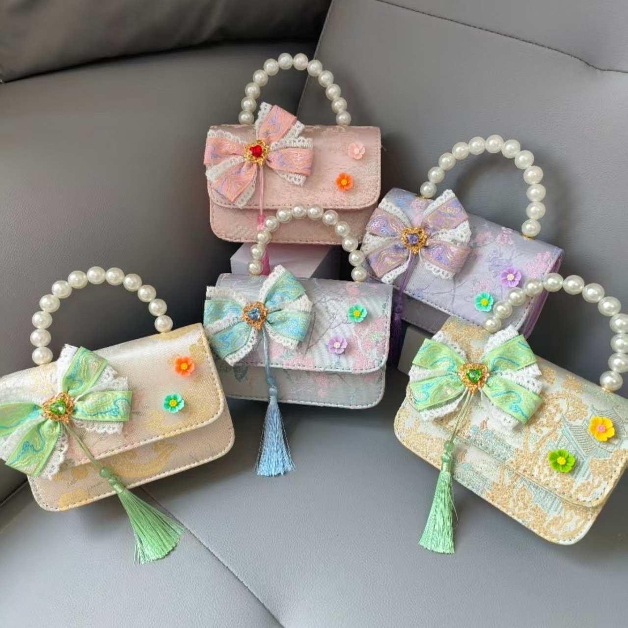 Bolsa portátil de la princesa de perlas estilo nacional arco de hombro bolso de cadena bolso pequeño bolso de cambio de Año Nuevo