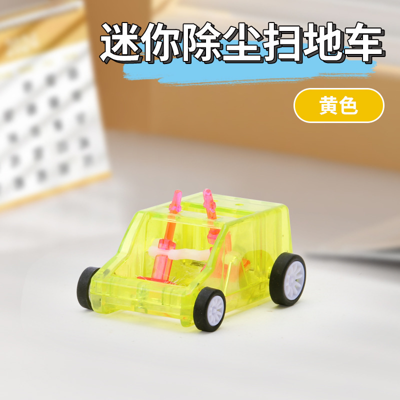 学生の子供のミニデスクトップの清潔な車の鉛筆のくずの消しゴムの掃除器のごみの車の手は滑車の子を押します。|undefined
