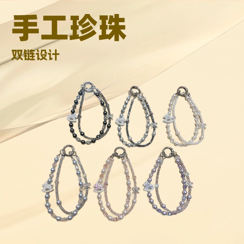 Ins viento hecho a mano perla de doble cadena para teléfono móvil cordón creativo pedrería troyano colgante muñeca cristal de una pieza