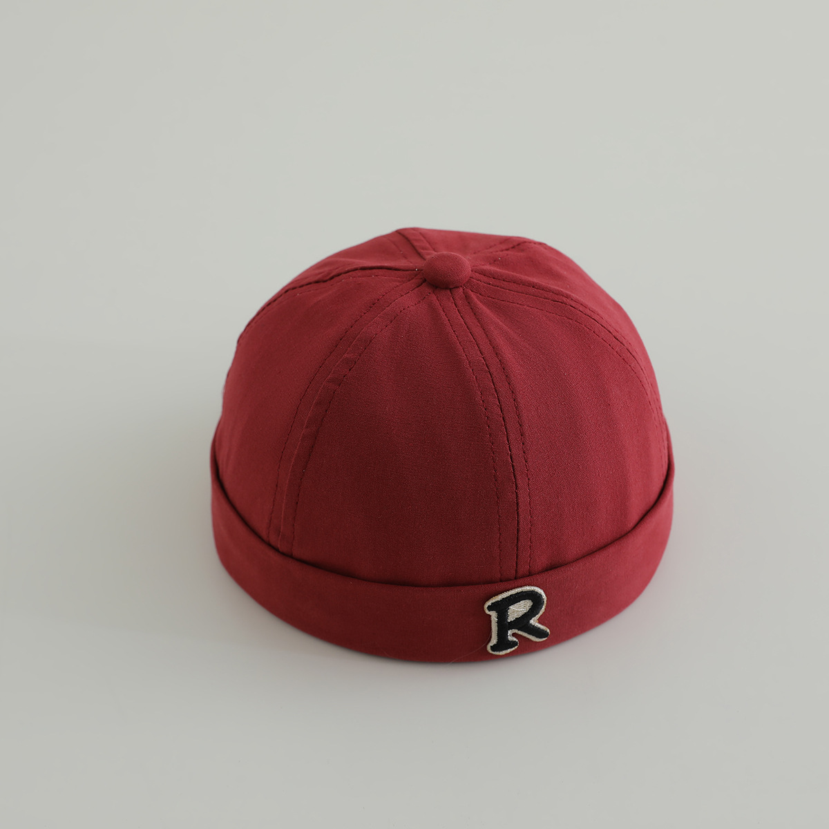 Primavera niños terratenientes sombreros hombres y mujeres letras de la marea sin bordes sombreros de piel de melón sombreros de calabaza sombreros de boina de personalidad