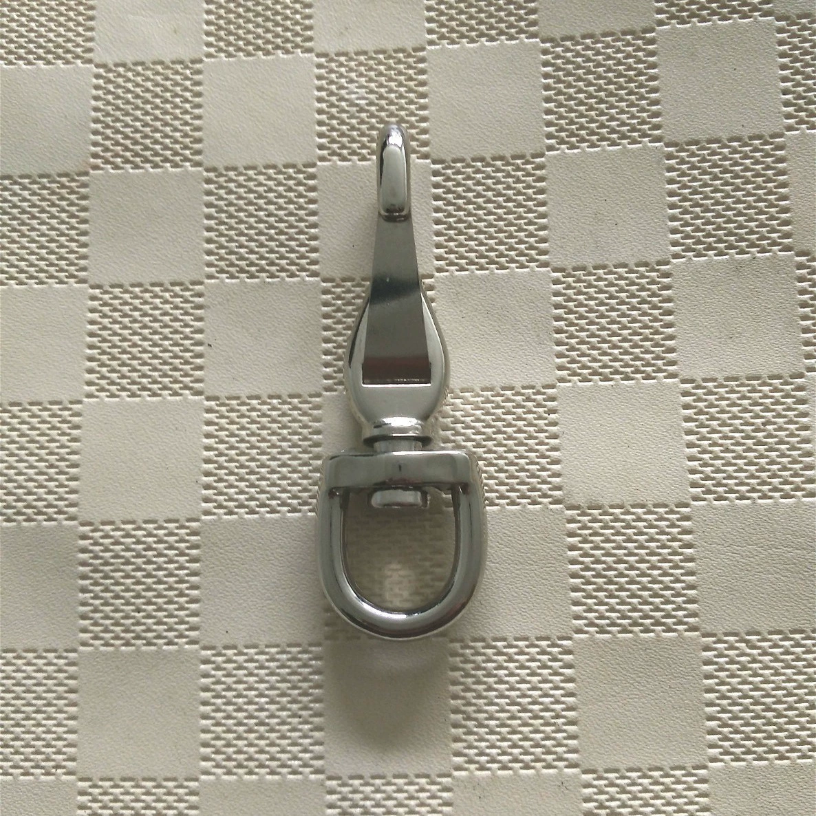 Производители производят крюк пояса любимчика, пряжка любимчика, пряжка крюка веревочки тяги, пряжка крюка весны.