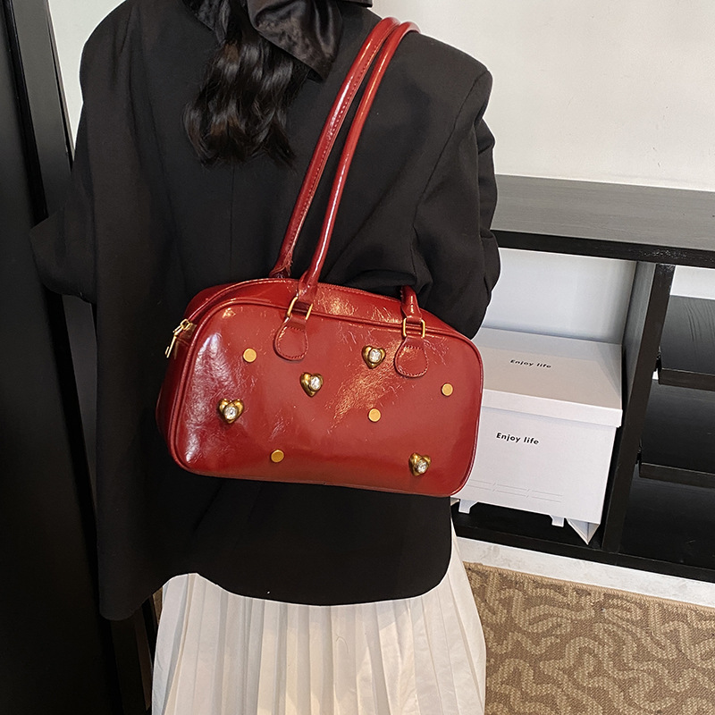 Bolsos transfronterizos de nuevo estilo para mujer Bolsos de almohada de alta gama de moda simple urbana Bolsos de hombro de todo fósforo diario para mujer