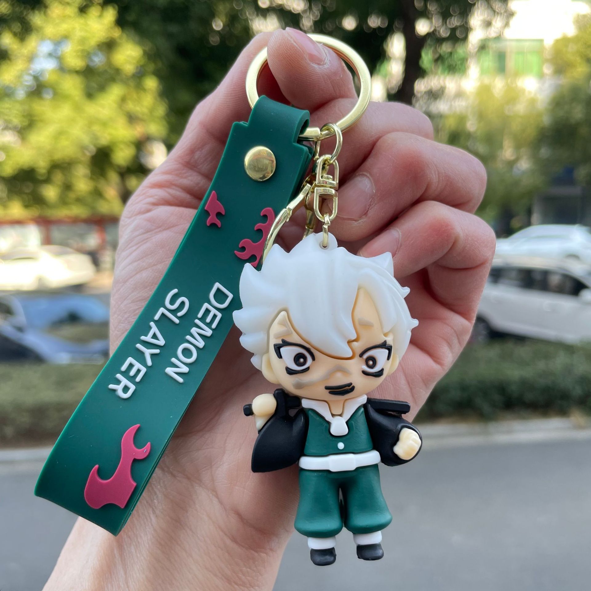 鬼滅の刃の鍵は自動車のキーチェーンの漫画の公仔のかばんのペンダントの子供機の小さい贈り物の卸売りを掛けます。