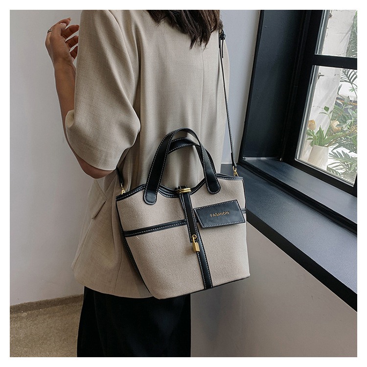 Nicho de diseño retrógrado lienzo portátil bolso de cubo de agua mujer 2026 nuevo cross-border ins canasta de moda bolso de mochila image 9
