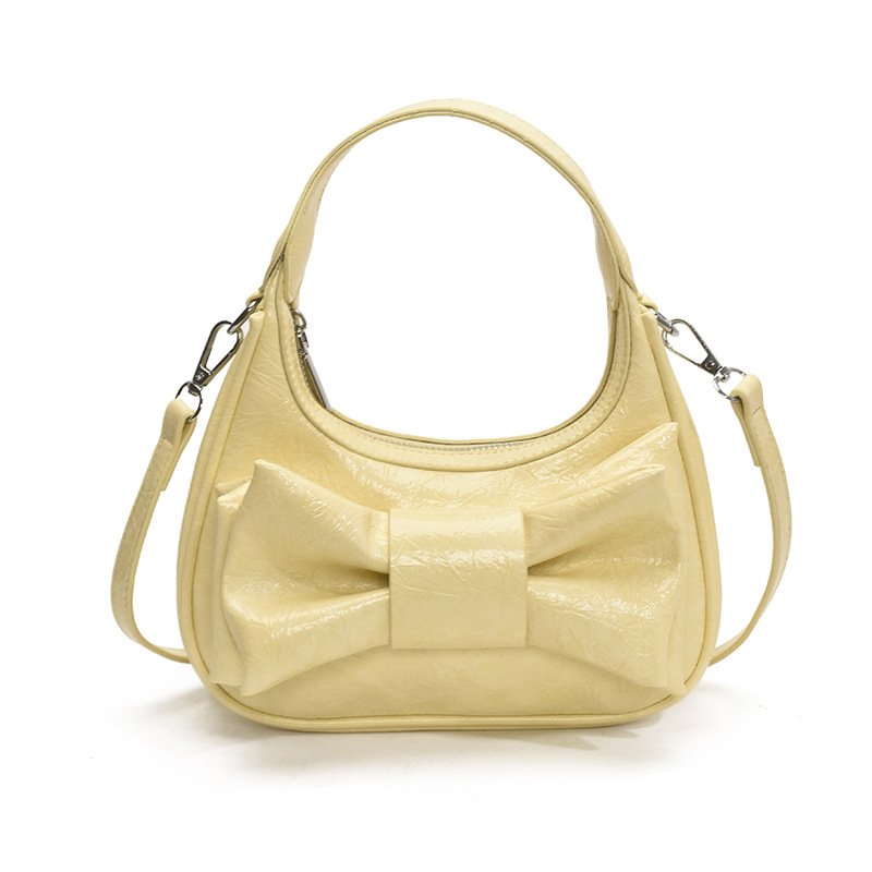 Bolso de moda coreano 2025 verano nuevo bolso femenino de alta calidad textura bolso de hombro lindo lazo bolso de mensajero