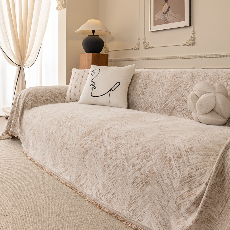 Cuatro estaciones de sofá universal 2025 nuevo sofá toalla de aire crema una manta de sofá todo incluido cojín anti-gato arañazo