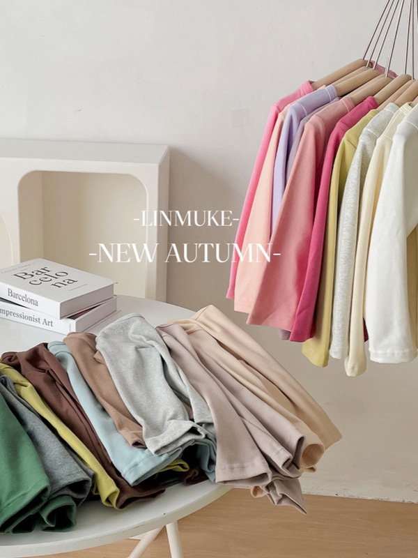 Camiseta de manga larga de algodón puro para niños 2026, camiseta básica para primavera y otoño, top cepillado de cuello redondo de color liso y corte holgado para niños y niñas.